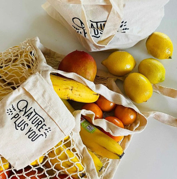 Grocery bag on the counter with produce spilling out